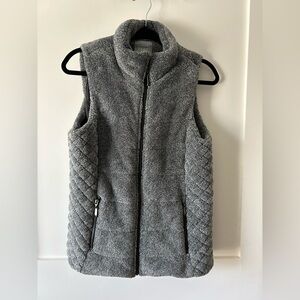This beautiful vest will keep you looking stylish while staying warm!
